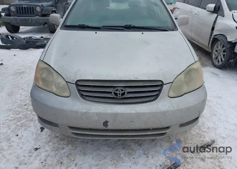 2003 Toyota Corolla Le z USA, uszkodzony, nr VIN JTDBR32E930050070